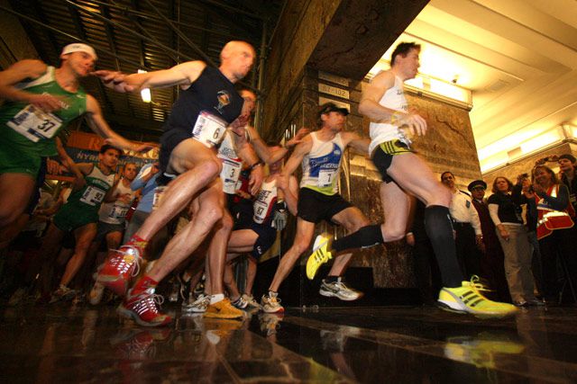Thomas Dold, right, of Germany, takes the lead of the men's pack at the start of the Empire State Building Run-Up.